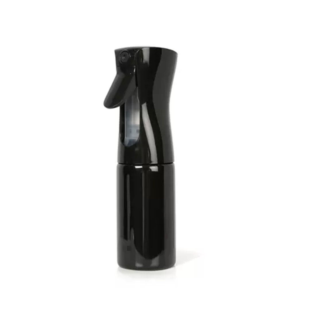 A barber's pole-patterned spray bottle isolated on a white background.